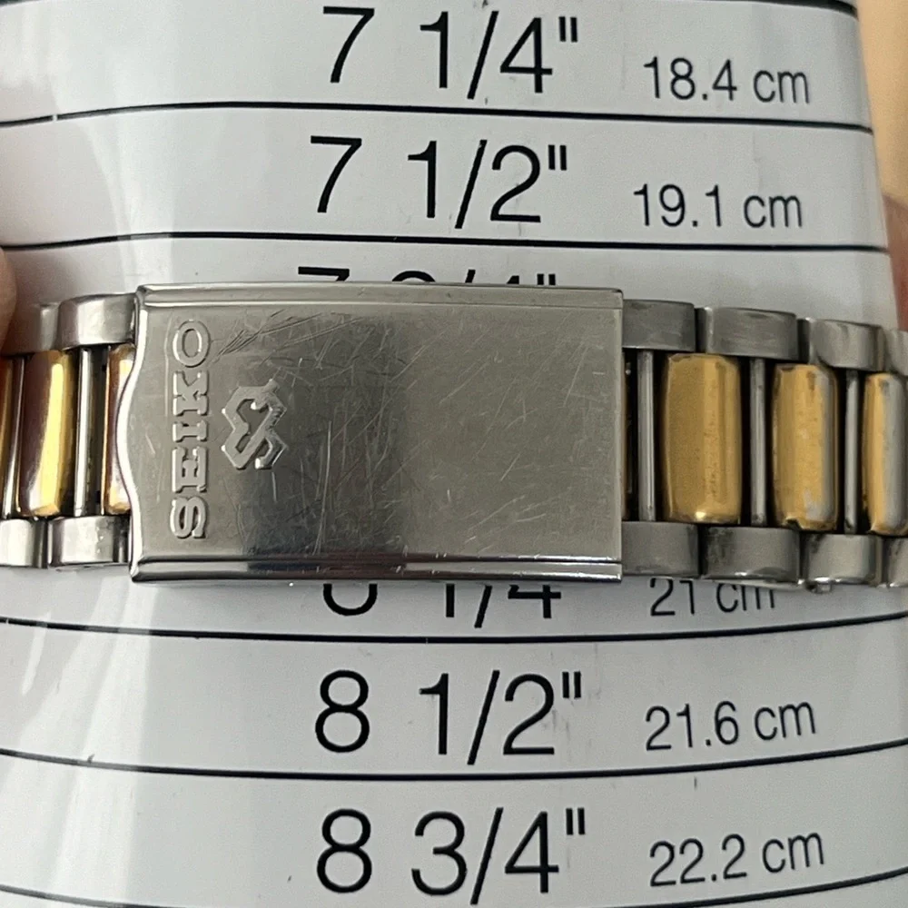Seiko SQ 100 Rare Vintage Men’s Watch Light Gold-Tone Dial Two-Tone Bracelet